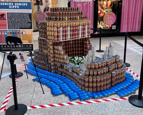 A hippo constructed out of donated food on display at Southgate Mall